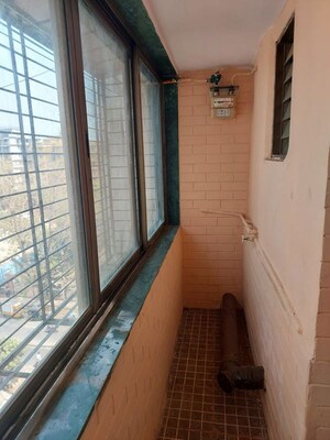 Building Lobby in 1 BHK Apartment at Tilak Nagar – for Rent