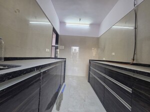 Kitchen in 2 BHK Apartment at Gurukrupa CHS, Goregaon West – for Rent