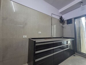 Kitchen in 2 BHK Apartment at Gurukrupa CHS, Goregaon West – for Rent
