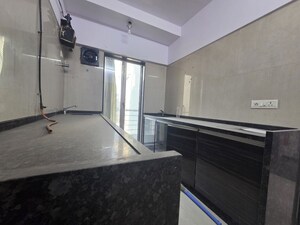 Kitchen in 2 BHK Apartment at Gurukrupa CHS, Goregaon West – for Rent