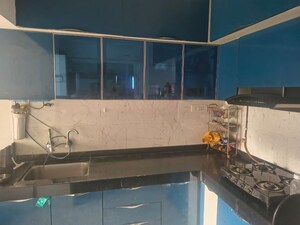 Kitchen in 2 BHK Apartment at Vinode Insignia, Wakad – for Rent