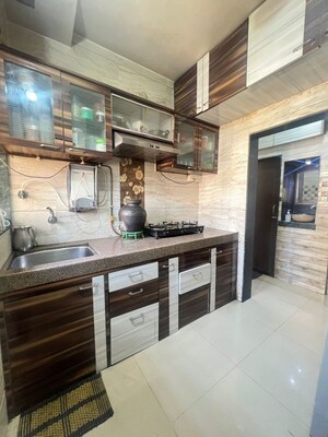 Kitchen in 1 BHK Apartment at Parsik Nagar – for Sale