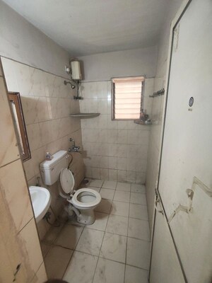 Bathroom in 2 BHK Apartment at Paradise Park, Katrap – for Rent