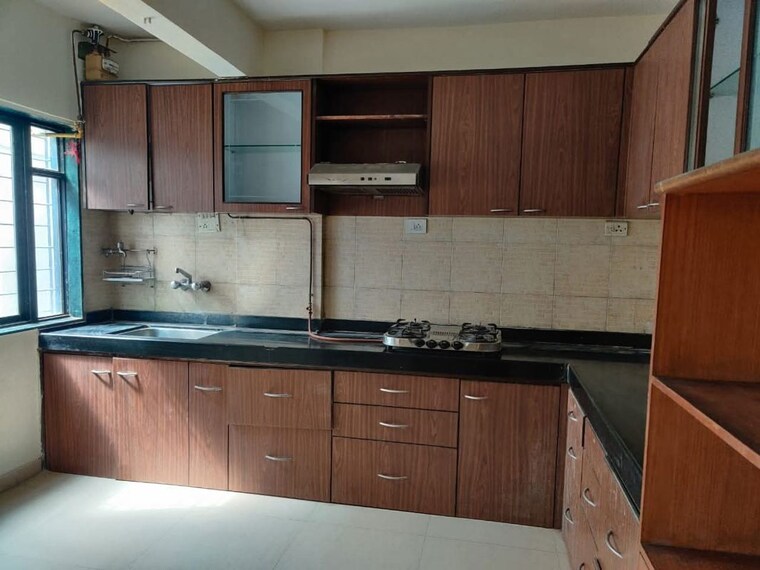 Kitchen, amrut-runwal-daffodils 3 Bedroom 1400 Sq.Ft. Penthouse In Nibm Pune 10174424
