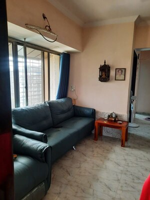 Living Room in 2 BHK Apartment at Royal Palms Garden View, Goregaon East – for Sale