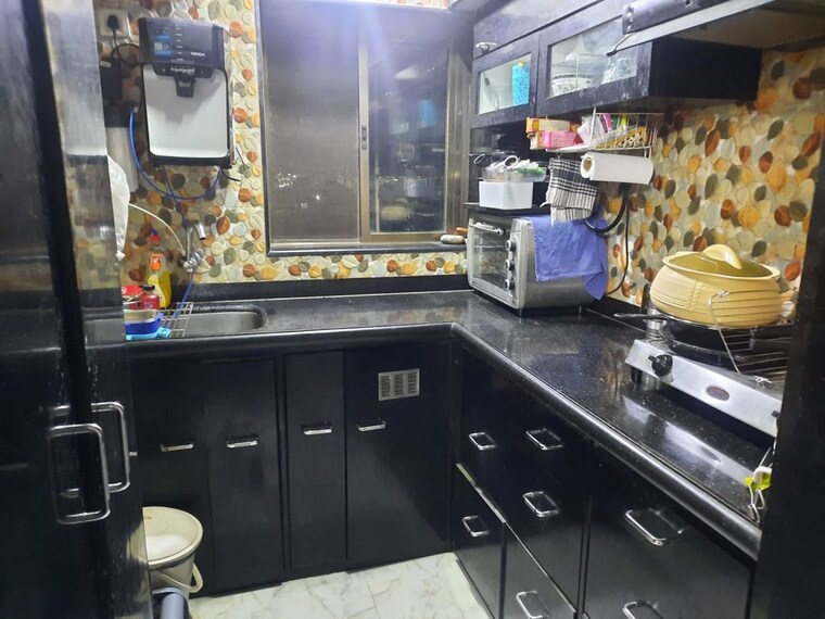 Kitchen, royal-palms-garden-view 2 Bedroom 800 Sq.Ft. Apartment In Goregaon East Mumbai 10174527
