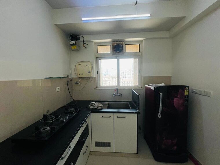 Kitchen, hiranandani-astra 2 Bedroom 1000 Sq.Ft. Apartment In Ghodbunder Road Thane 10174432