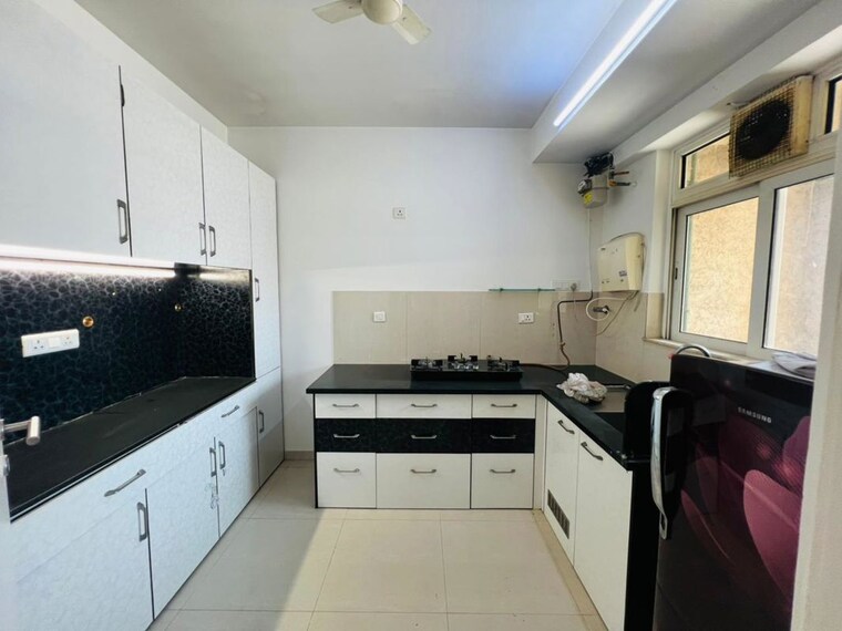 Kitchen, hiranandani-astra 2 Bedroom 1000 Sq.Ft. Apartment In Ghodbunder Road Thane 10174432
