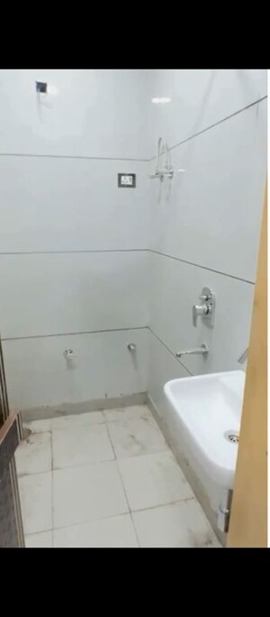 Bathroom in 2 BHK Builder Floor at Dwarka Mor – for Sale