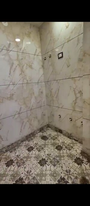 Bathroom in 2 BHK Builder Floor at Dwarka Mor – for Sale