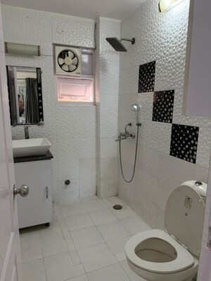 Bathroom in 3 BHK Apartment at Niho Saffron Scottish Garden, Ahinsa Khand 2 – for Rent