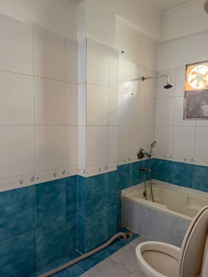 Bathroom in 3 BHK Apartment at Niho Saffron Scottish Garden, Ahinsa Khand 2 – for Rent