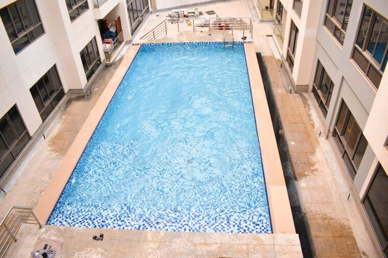 Swimming Pool, om-viraj-apartment 2 Bedroom 950 Sq.Ft. Apartment In Andheri West Mumbai 10174882
