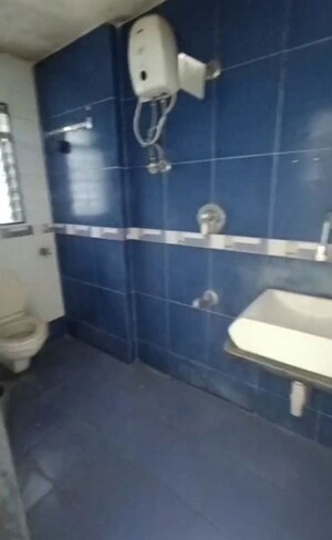 Bathroom in 2 BHK Apartment at Rajanigandha Upvan, Gawand Baug – for Rent