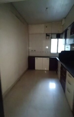 Kitchen in 2 BHK Apartment at Rajanigandha Upvan, Gawand Baug – for Rent
