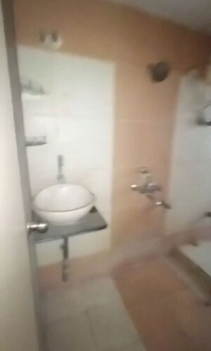 Bathroom in 2 BHK Apartment at Rajanigandha Upvan, Gawand Baug – for Rent