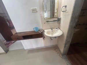 Bathroom in 2 BHK Apartment at Gurusamridhi Heights CHS, Sanpada – for Rent