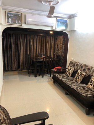 Living Room in 2 BHK Apartment at Thakur Vishnu Shivam Tower, Kandivali East – for Rent