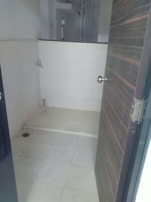 Bathroom in 2 BHK Apartment at Wadhwani Sai Paradise, Punawale – for Rent