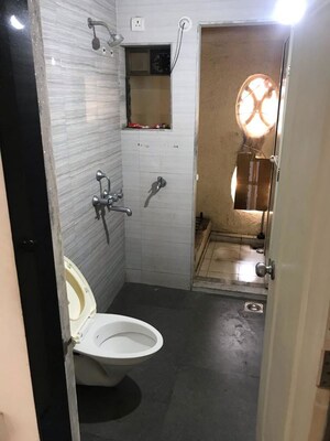 Bathroom in 2 BHK Apartment at Cosmos Jewels, Ghodbunder Road – for Rent