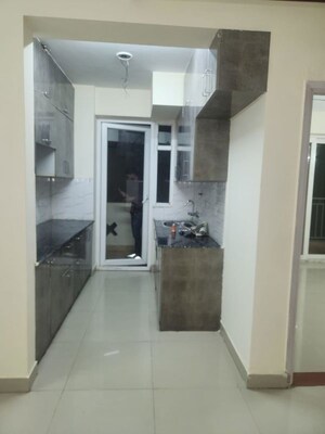 Kitchen in 3 BHK Apartment at Nirala Estate II, Tech Zone 4 Greater Noida – for Rent