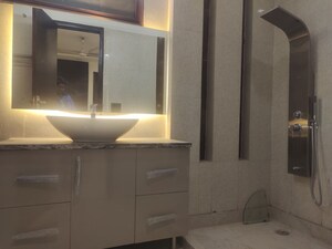Bathroom in 4 BHK Builder Floor at Kailash Colony – for Sale