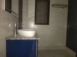 Bathroom in 4 BHK Builder Floor at Kailash Colony – for Sale