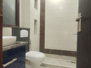 Bathroom in 4 BHK Builder Floor at Kailash Colony – for Sale