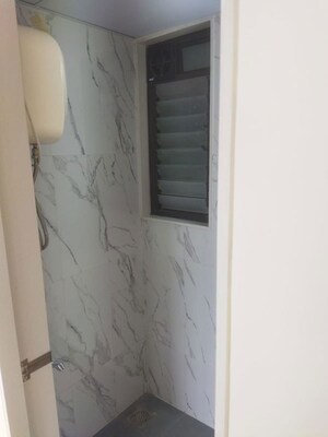 Bathroom in 1 BHK Apartment at Lodha Crown Taloja Quality Homes, Dombivli East – for Rent