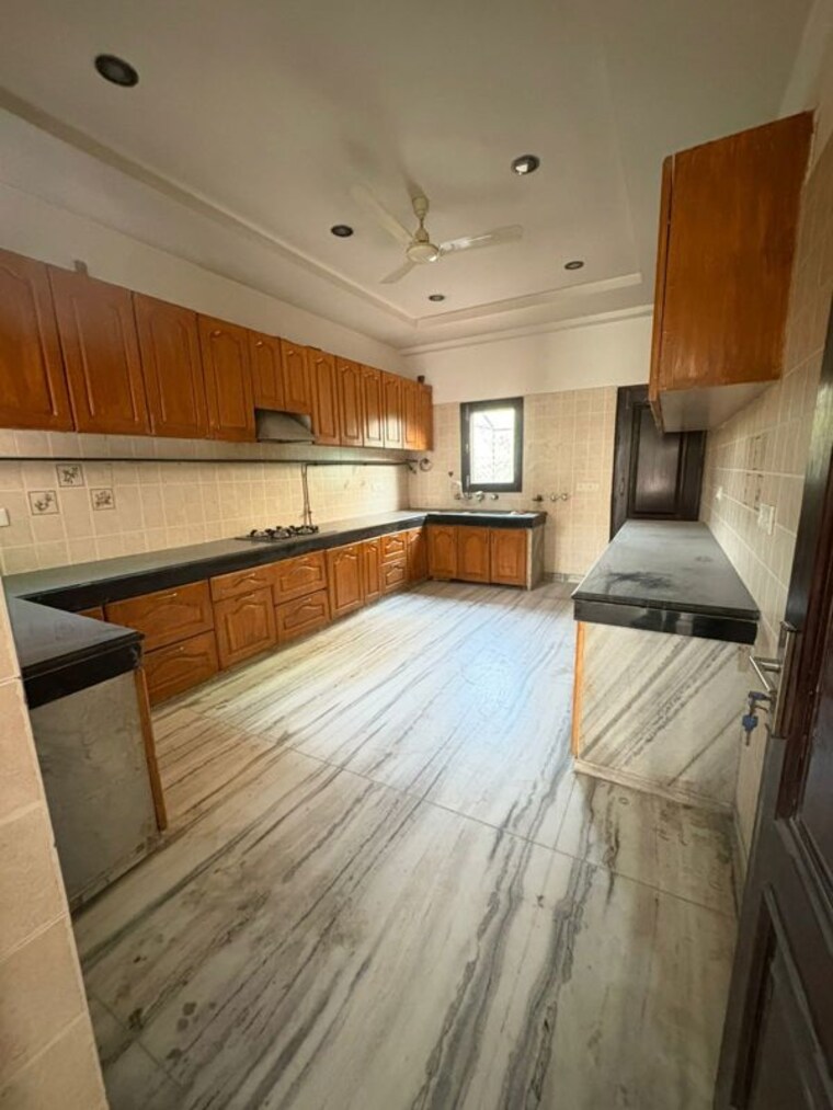 Kitchen, greenwoods-society 3.5 Bedroom 500 Sq.Yd. Independent House In Omega Iv Greater Noida Greater Noida 10175097