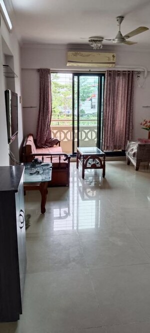 Living Room in 2 BHK Apartment at Gundecha Builders Marigold, Kandivali East – for Sale