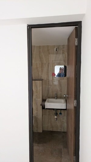 Bathroom in 1 BHK Apartment at Lodha Amara, Kolshet Road – for Rent