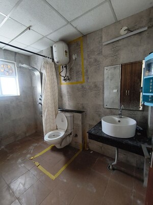 Bathroom in 3 BHK Apartment at Sushma Infinium, Ghazipur – for Rent