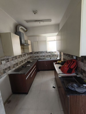 Kitchen in 3 BHK Apartment at Sushma Infinium, Ghazipur – for Rent