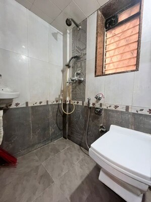 Bathroom in 1 BHK Apartment at Lokhandwala Complex – for Rent