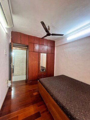 Bedroom in 1 BHK Apartment at Lokhandwala Complex – for Rent