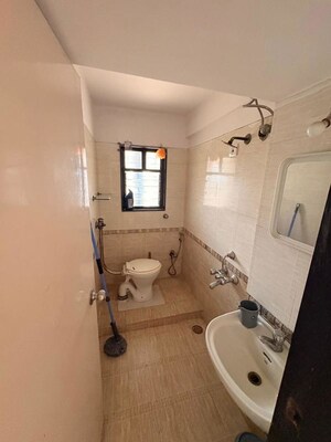 Bathroom in 2 BHK Apartment at Jeevan Sapna Apartment, Andheri West – for Rent