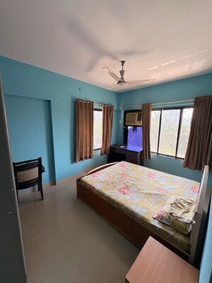 Bedroom in 2 BHK Apartment at Jeevan Sapna Apartment, Andheri West – for Rent