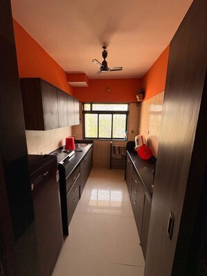 Kitchen in 2 BHK Apartment at Jeevan Sapna Apartment, Andheri West – for Rent