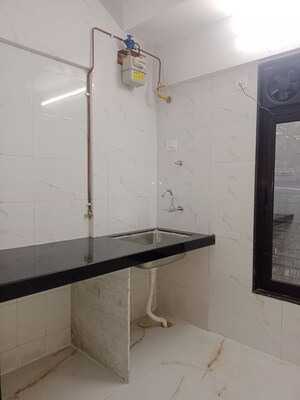 Kitchen in 1 BHK Apartment at CH Om Aarti, Borivali West – for Rent