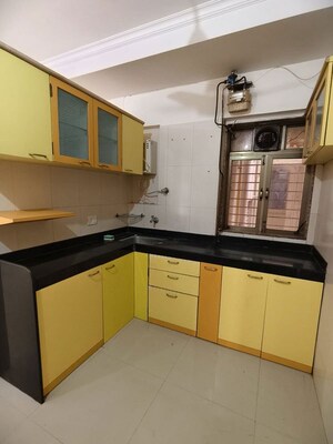 Kitchen in 2 BHK Apartment at Sadguru Complex I, Goregaon East – for Rent