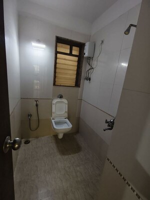 Bathroom in 2 BHK Apartment at Sadguru Complex I, Goregaon East – for Rent
