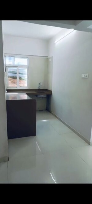 Kitchen in 1 BHK Apartment at Dosti West County Phase 4 Dosti Pine, Balkum Pada – for Sale