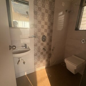 Bathroom in 1 BHK Apartment at Shantidham CHS, Tagore Nagar – for Rent