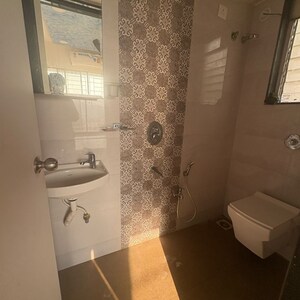 Bathroom in 1 BHK Apartment at Shantidham CHS, Tagore Nagar – for Rent