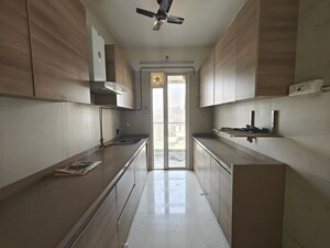 Kitchen in 2 BHK Apartment at Akshar Alvario, Seawoods – for Rent