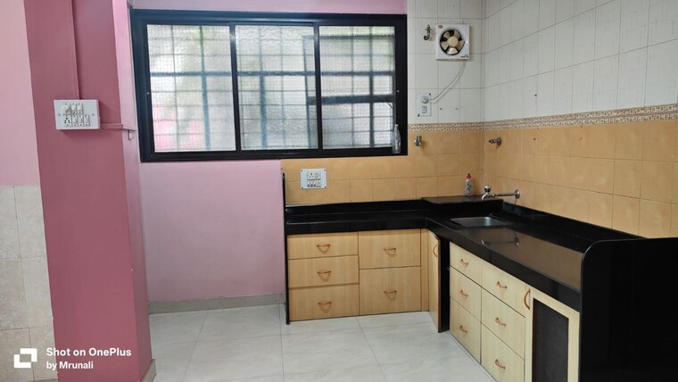Kitchen, ashwini-apartments-pandurang-colony 2 Bedroom 1001 Sq.Ft. Apartment In Pandurang Colony Pune 10175245