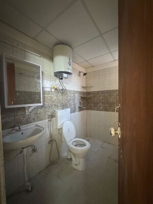 Bathroom in 2 BHK Apartment at MRG The Balcony, Sector 93 – for Rent