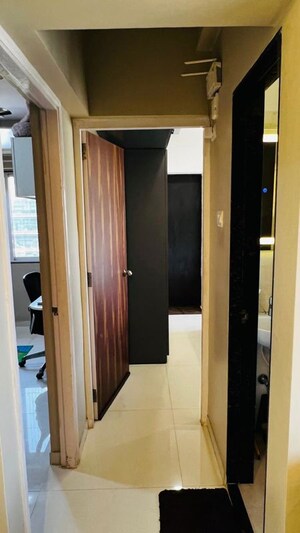 Building Lobby in 2 BHK Apartment at Rustomjee Alpine, Malad West – for Rent