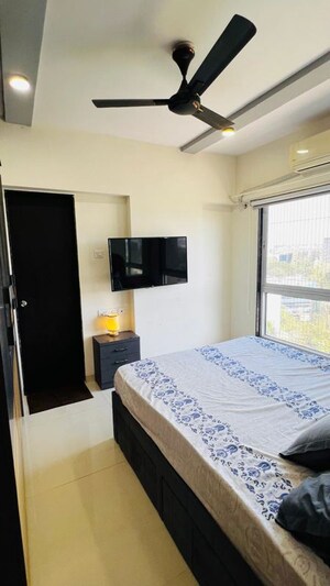 Bedroom in 1 BHK Apartment at K Raheja Palm Court J Building, Malad West – for Rent